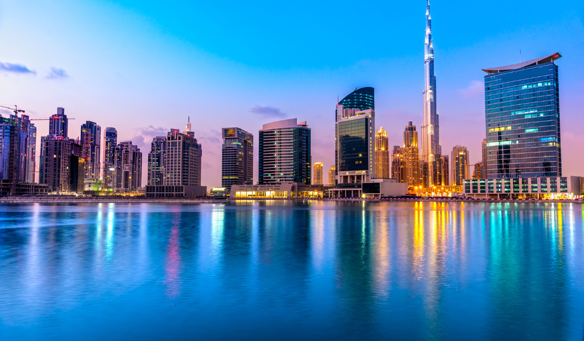 Burj Khalifa Dubai skyline with modern skyscrapers lit at night
