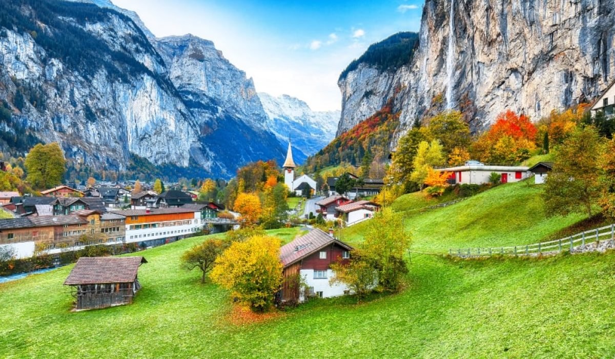 Mall Road in Nainital with shops, cafes, and tourists walking.