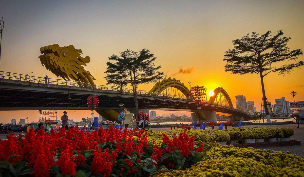 Tourists on wooden boats exploring Mekong Delta river in Vietnam.